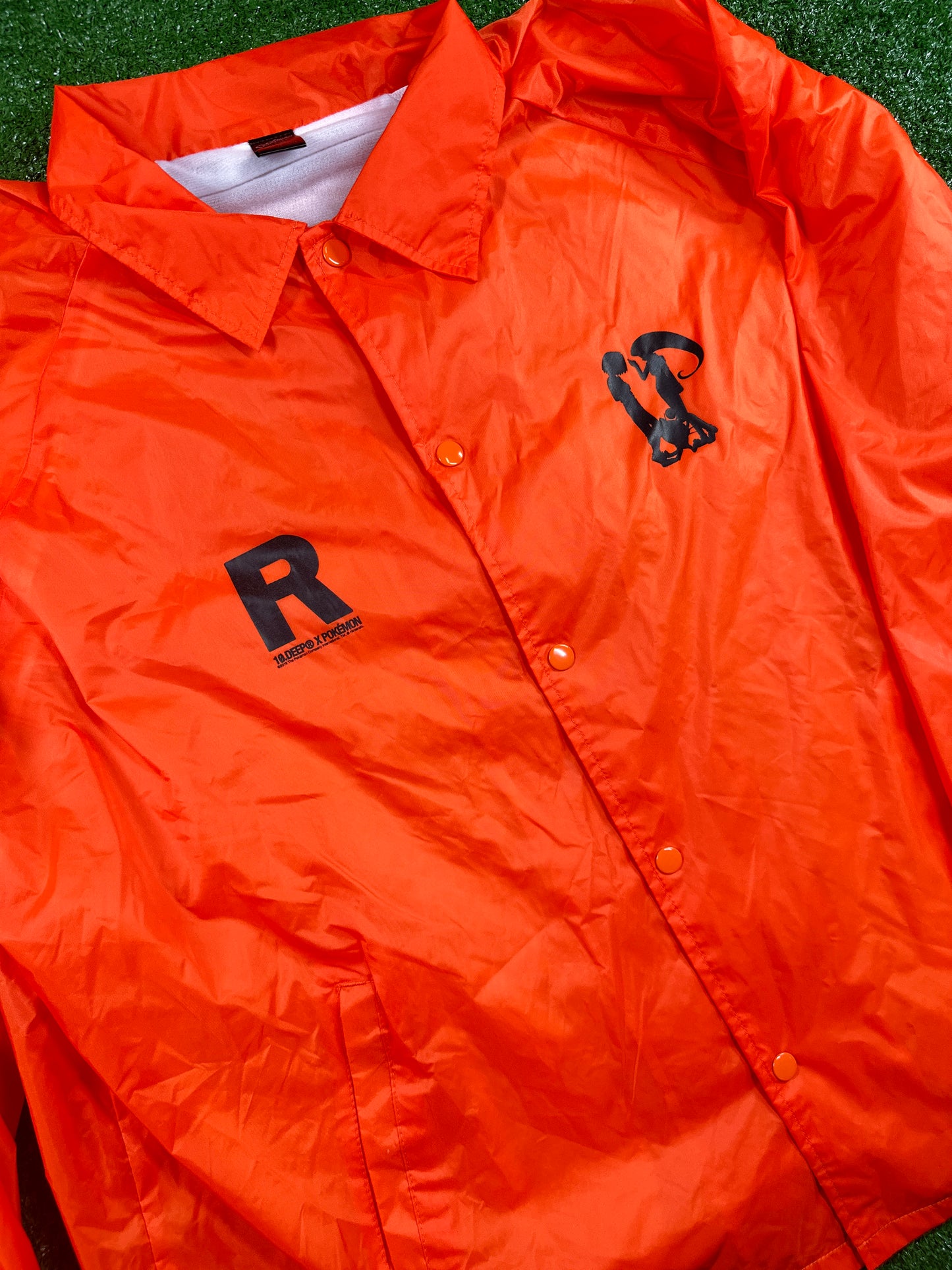 10 Deep X Pokemon 'Team Rocket' Orange Windbreaker - Size XXL