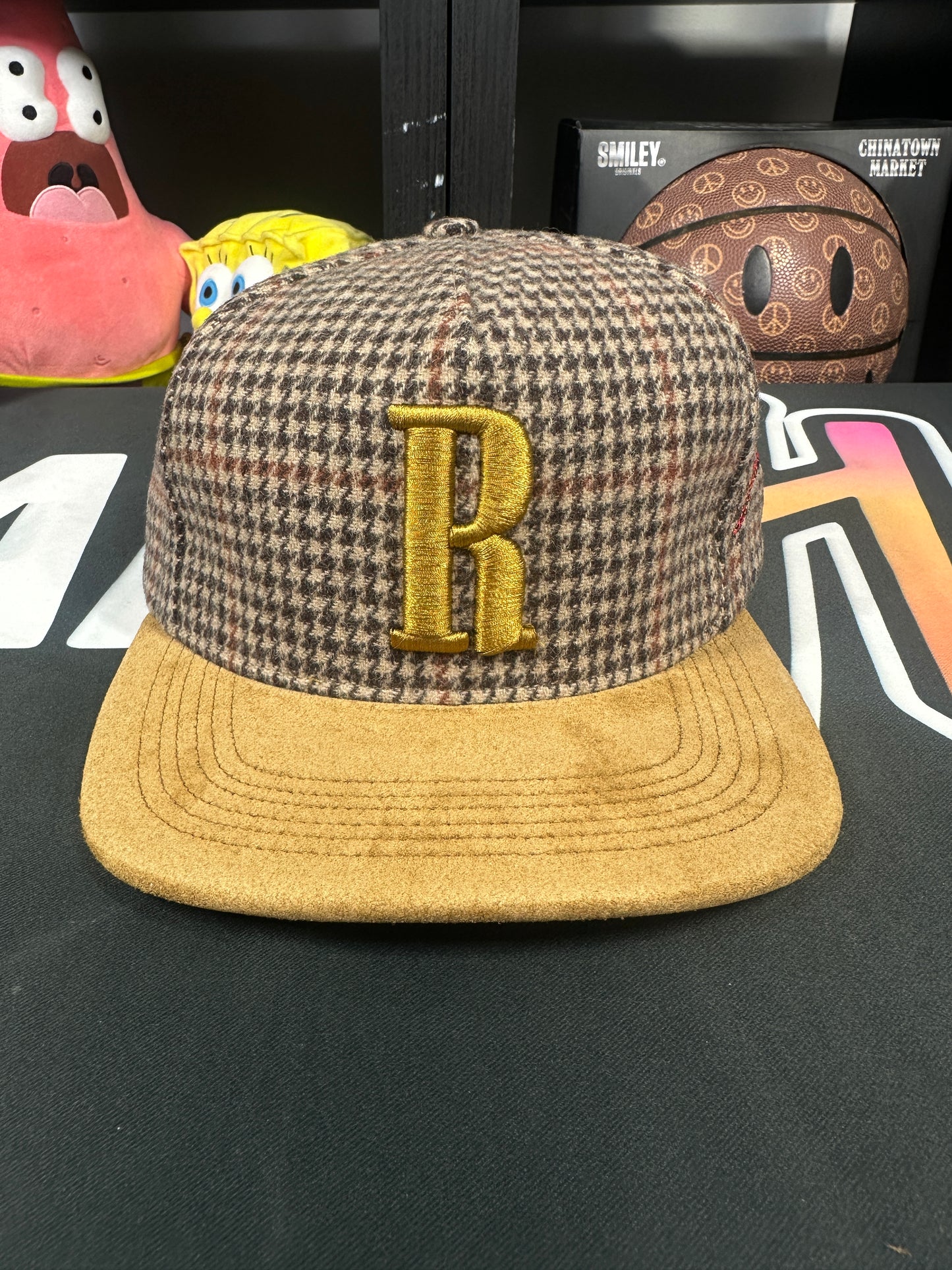 Rhude Houndstooth Duck Hunter SnapBack Hat MSRP: $300.00