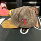 Rhude Houndstooth Duck Hunter SnapBack Hat MSRP: $300.00